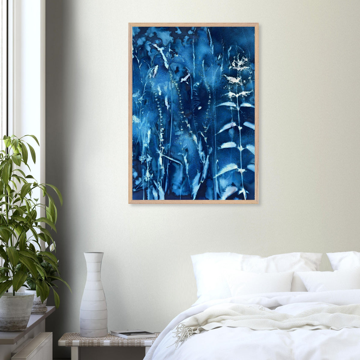 A1 Hedgerow with Nettles botanical cyanotype art print shown styled on a bedroom wall